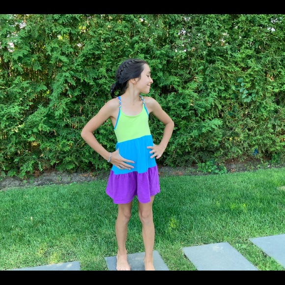 Super nice cover up with a unique behind! - Picture 1 of 3